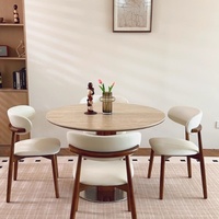 Ensemble de table à manger ronde en marbre minimaliste moderne avec cadre en bois massif et chaises rembourrées