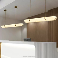 Lustre en résine imitation albâtre, luminaire suspendu en forme d'anneau torsadé, lampe LED d'art moderne, éclairage de hall de villa, lampe au design créatif