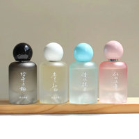 Emballage de parfum personnalisé de luxe, flacon en verre cylindrique vide de 30 ml, 50 ml, 100 ml, vaporisateur de parfum, flacon de parfum rose givré avec boîte