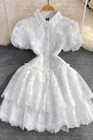 Robe Gâteau Évasée Blouse Bulle Broderie Blanche Boutonnage Simple Col Revers Style Rétro Tempérament Super Fée Été 2026 en Gros
