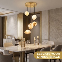 Suspension LED moderne de luxe en albâtre naturel texturé avec cordons de longueur intermédiaire décalée pour loft et salle à manger