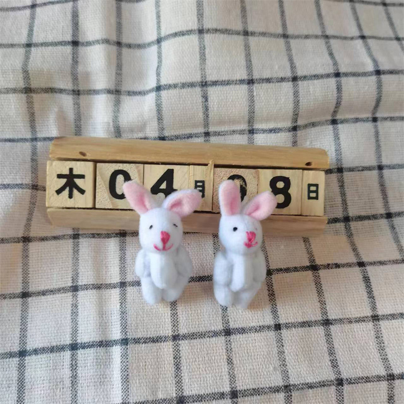 Tissu en laine à tirer de 45 cm, lapin blanc pur.