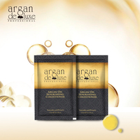 Argán deluxe de tamaño de viaje sobre el champú y acondicionador