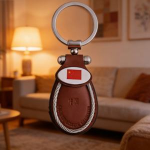 China Factory Direct Price <b>Brown</b> Color Debossed Logo Simple Design Keychain - Product Image 1