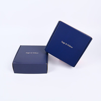 Emballage de bouteille de parfum de soins de la peau bleu marine de 50ml avec logo personnalisé bon marché boîte en carton ondulé de fabrication chinoise
