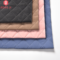 Remise 100% polyester 290gsm Release Emboss avec 300T Semi Dull Taffetas Cire imperméable ton à ton tissu pour doudoune