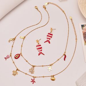 Bracciale, Collana e Orecchini in Acciaio Inox con Zirconi 5A Rosso Corallo, Design Elegante con Polpo e Tartaruga - Product Image 1