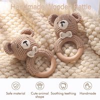 Produit transfrontalier très vendu : Hochet et jouet de dentition apaisant pour bébé, en coton, crocheté à la main, motif ours de dessin animé, avec clochette de lit