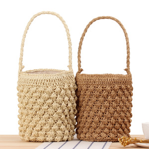 Nuova Borsa a Secchiello <span class=keywords><strong>in</strong></span> <span class=keywords><strong>Rafia</strong></span> Intrecciata con Design Moderno per Donne, Ideale per Spiaggia e Vacanze - Product Image 1