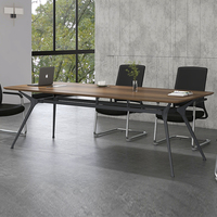 Grande table de conférence rectangulaire avec passe-câbles intégrés pour bureau, réunion et négociation