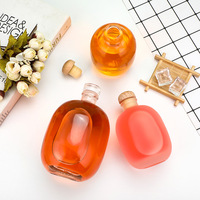 Vente en gros de bouteilles en verre rondes à petite ouverture, transparentes et givrées, de 100 ml, 250 ml, 375 ml et 500 ml, pour jus de fruits, vin, avec bouchon, logo personnalisé