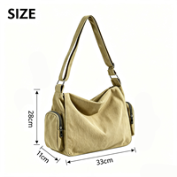 Sac bandoulière hobo en toile grande capacité, décontracté et souple, avec poches latérales, idéal pour les trajets quotidiens, l'école et le shopping