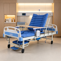 Lit d'hôpital manuel multifonctionnel avec fonctions de commode et de rotation