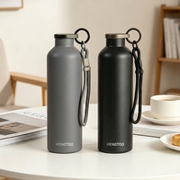 Bouteille isotherme en acier inoxydable 304 de 650 ml pour bureau, double paroi sous vide, maintien thermique 12-24h, avec sangle en paracorde et couvercle métallique – Vente en gros