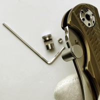 Couteau pliant Buck 110 à bouton-poussoir en acier inoxydable 416, avec vis de poussée