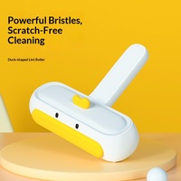 Brosse anti-poils pour animaux en PP, grattoir à poils flottants, design petit canard, fournitures pour chats, best-seller transfrontalier