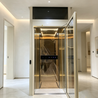 Ascenseur hydraulique intérieur moderne avec éclairage LED lumineux, rail de guidage robuste et arrêt d'urgence sécurisé pour projets de résidences privées