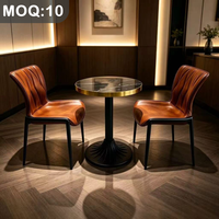 Personnalisation OEM ODM, table ronde en pierre pliable de luxe moderne, ensemble de chaises de salle à manger en métal recouvertes de cuir pour restaurant, bar