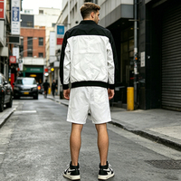 Ensemble coupe-vent 2 pièces pour homme, imprimé color-block, streetwear, veste à col montant entièrement zippée + short en mesh à boutons-pression latéraux, ensemble de survêtement