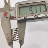 Ressort de torsion pour downlight en acier nickelé, longueur 55 mm, largeur 16 mm, diamètre extérieur de la bobine 9,1 mm, avec clip et capuchon en caoutchouc, charge de 7 lb
