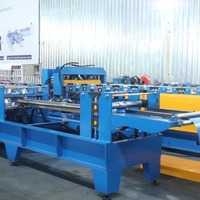 Machine de formage à rouleaux automatique haute vitesse pour gouttières en acier avec composants essentiels : moteur, engrenage, roulement, pompe, boîte de vitesses