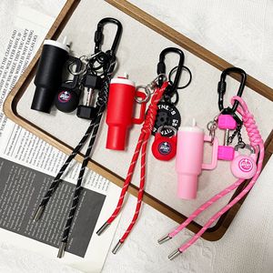 RW Wholesale Breloques porte-clés mignonnes pour gobelets, porte-clés personnalisés tendance en forme d'haltères <span class=keywords><strong>Crogs</strong></span>, porte-baume à lèvres avec pompon en corde tressée - Product Image 1