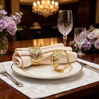 Ensemble d'anneaux de serviette élégants en forme de feuille dorée - Parfaits pour les mariages, les fêtes et la décoration de Noël |   Supports de table réutilisables en fonte