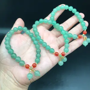 亚洲天然愈合圆形宝石珠弹力绿色金星灵气手链儿童礼品