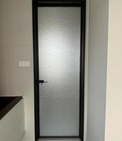 Porte de salle de bain à cadre fin en aluminium avec verre dépoli pour l'intimité, design moderne, pour hôtels et villas, surface finie
