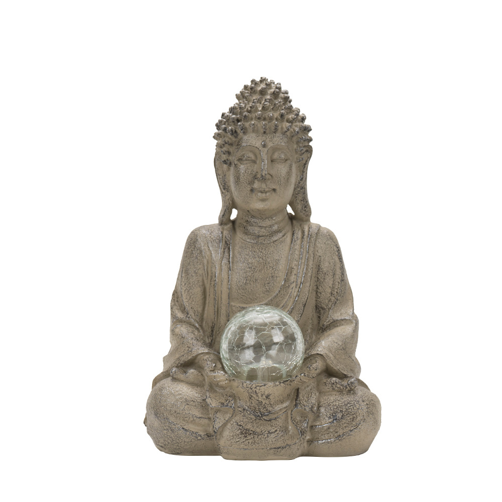 พระพุทธรูปสีสันสดใสถือตะเกียง