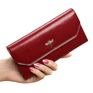 2022 Wristlet เงินคลิปผู้หญิงออกแบบที่กำหนดเองหนังแท้สีแดงกระเป๋าสตางค์สุภาพสตรีคลัทช์กระเป๋า