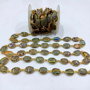 Chaîne de pierres précieuses avec connecteur en agate Fordite Briolette 10x15mm - Product Image 1