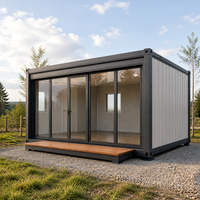 Maison conteneur préfabriquée à ouverture latérale, mur frontal entièrement vitré, cabine portable pour bureau, espace de vie et hébergement sur chantier