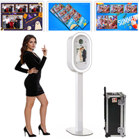 Photomaton ovale pour iPad à impression instantanée et borne photo contrôlée par application avec flight case pour événements
