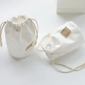 Wholesale custom stand up cotton drawstring pouch watch bag canvas jewelry storage pouch packaging