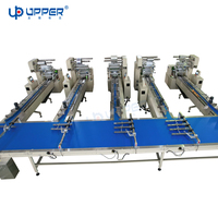 Ligne d'emballage à grande vitesse de flux de rouleau suisse de gâteau de livre de cupcake machine de paquet de gâteau acier inoxydable de bonne qualité