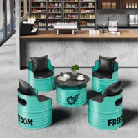 Ensemble table et chaises en fer forgé style industriel, design fût de pétrole, pour 4 personnes, idéal pour salons de thé, gymnases, ateliers de motos de course, et canapés de bar.