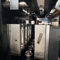 Petites machines de soufflage entièrement automatiques de haute qualité pour la production de bouteilles en plastique vides à 4 cavités, 4000 BPH