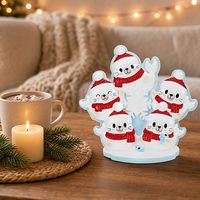 Figurine de Noël en résine Famille de phoques, motif flocon de neige arctique, avec pêcheur, bonnet de Père Noël et écharpe, sur base de neige, décoration animale autoportante