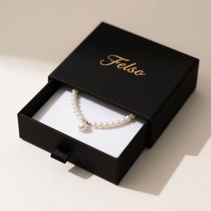 Boîte cadeau de luxe personnalisée avec logo, emballage à tiroir, design coulissant, impression en relief pour petits bijoux, parfums, boîte en carton rigide - Product Image 1