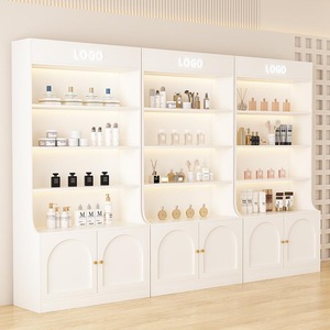 Mueble de Exhibición Cosmético Minimalista Blanco con Iluminación LED y Puertas de Almacenamiento para Salón de Belleza - Product Image 2