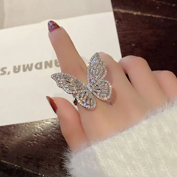 K033韓国のトレンディなウェディングジュエリー誇張された中空の調節可能なリング女性のための光沢のある蝶のオープニングリング