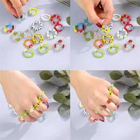 Manik-manik beras bunga Bohemian wanita cincin elastis tujuh warna desain bunga Multi Warna