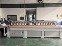 Machine à clouer automatique JiNan YuanNuo 600*3000 mm pour panneaux acoustiques insonorisants avec servomoteur et 20 pistolets à clous standard