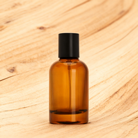 Vente en gros de flacons de parfum en verre ambré cylindriques de 30 ml, vides, avec vaporisateur à pompe et couvercle noir, emballage en boîte