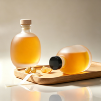Bouteilles en verre givré rondes vides de haute qualité de 100 ml, 250 ml, 500 ml pour jus, vin et autres boissons, idéales pour l'emballage de vin de fruits