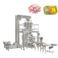 Peseuse combinée multifonctions à 14 têtes Remplissage de noix de bonbons gommeux Peseuse multitête automatique Machine d'emballage