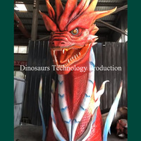 Tête de dragon géante animatronique faite à la main ou décorations de monstres artificiels pour aire de jeux