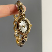 Luoyan jam tangan wanita besi tahan karat perhiasan estetika Oriental baru jam tangan gelang kuarsa batu mata harimau Dial kecil giok Oval