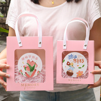 Nouveau sac cadeau transparent haut de gamme en papier, idéal pour la Saint-Valentin, les anniversaires et les cadeaux.